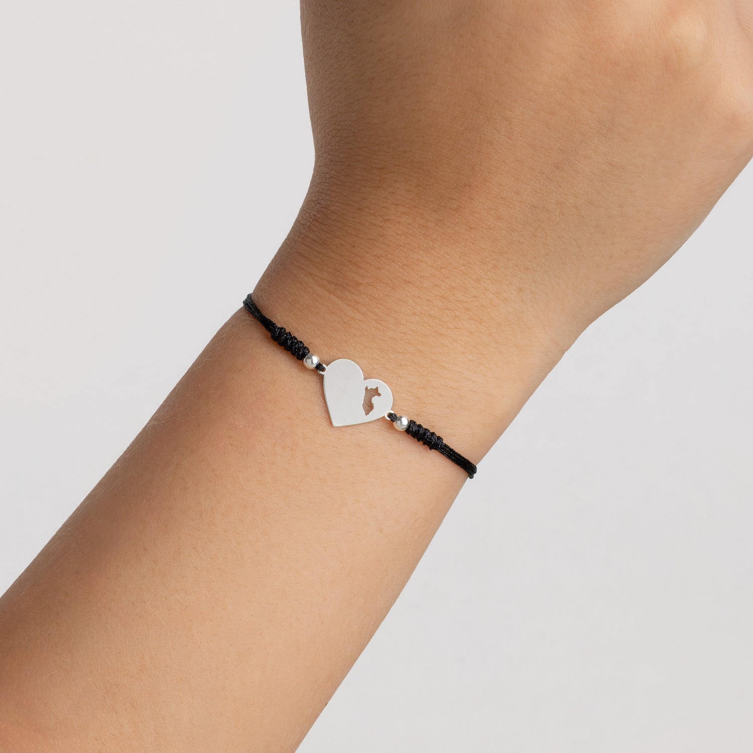 Pulsera Lia Snake negro - Corazón mapa del Perú