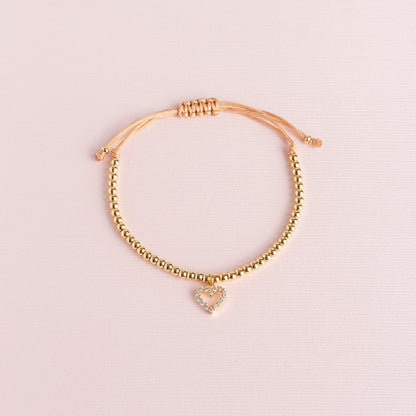 Pulsera Sole Esfera Hilo Corazón Calado Strass