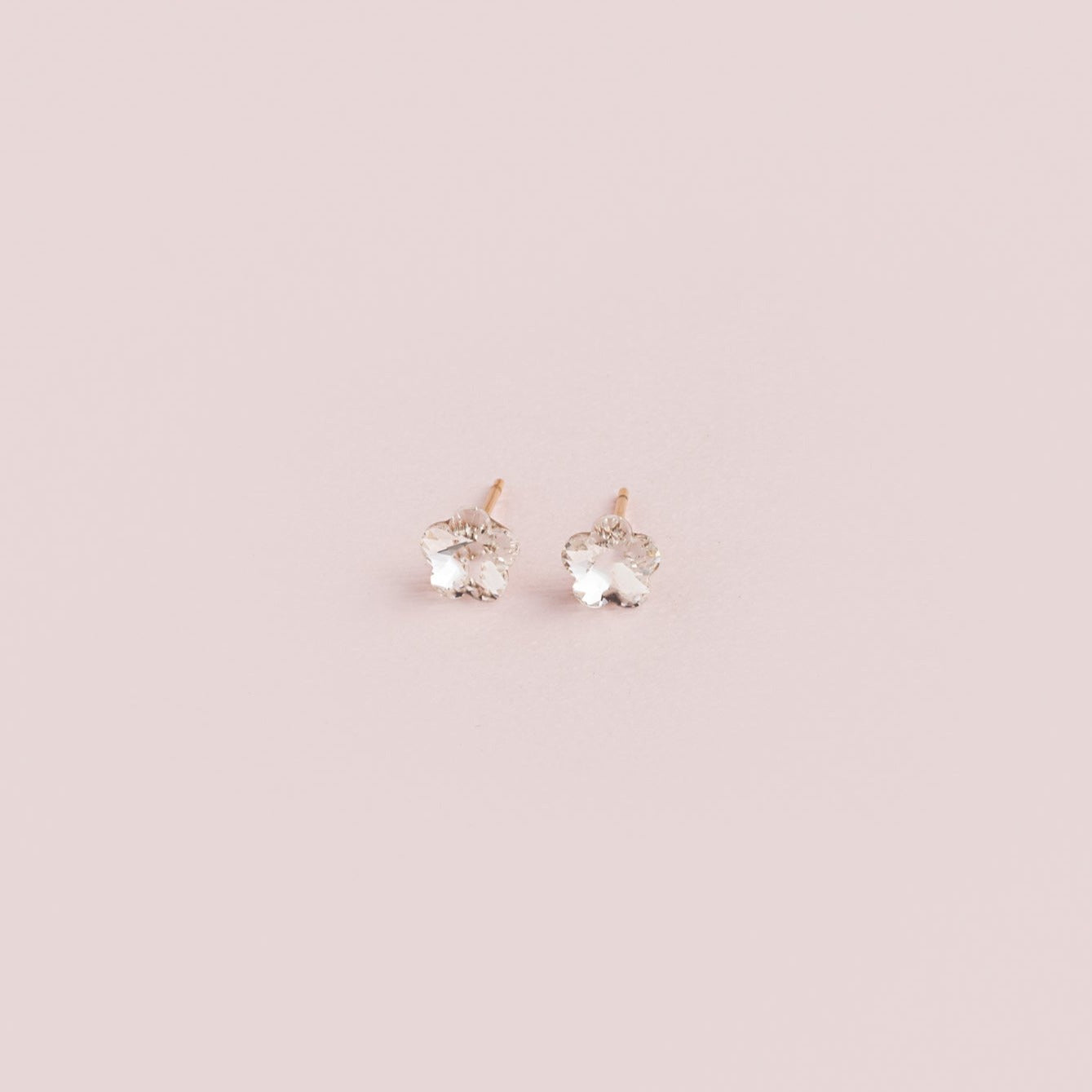 Aretes Flor de Luz Blanco