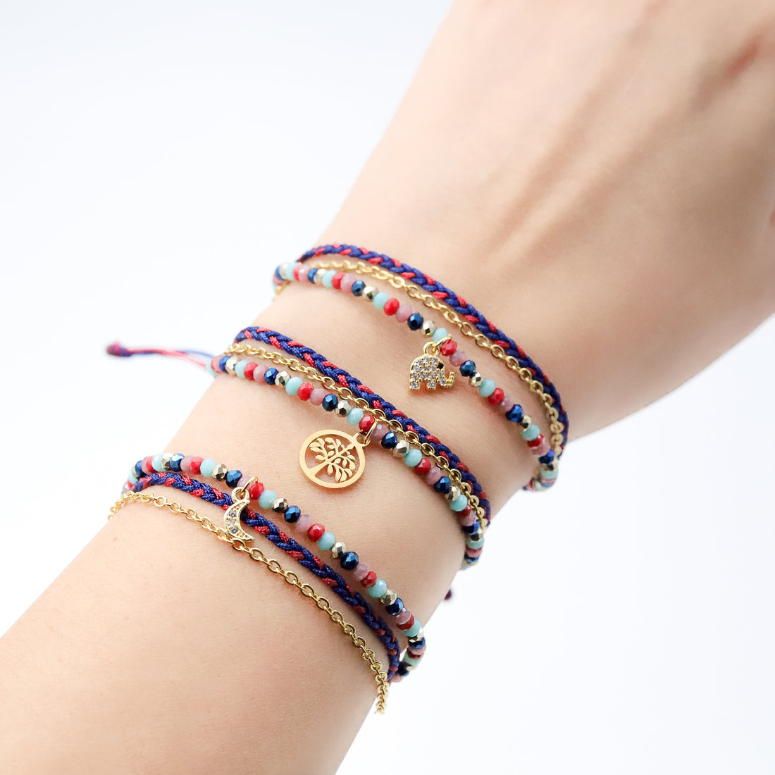 Pulsera Julieta triple tonos guinda-turquesa: elefante, arbolito, luna