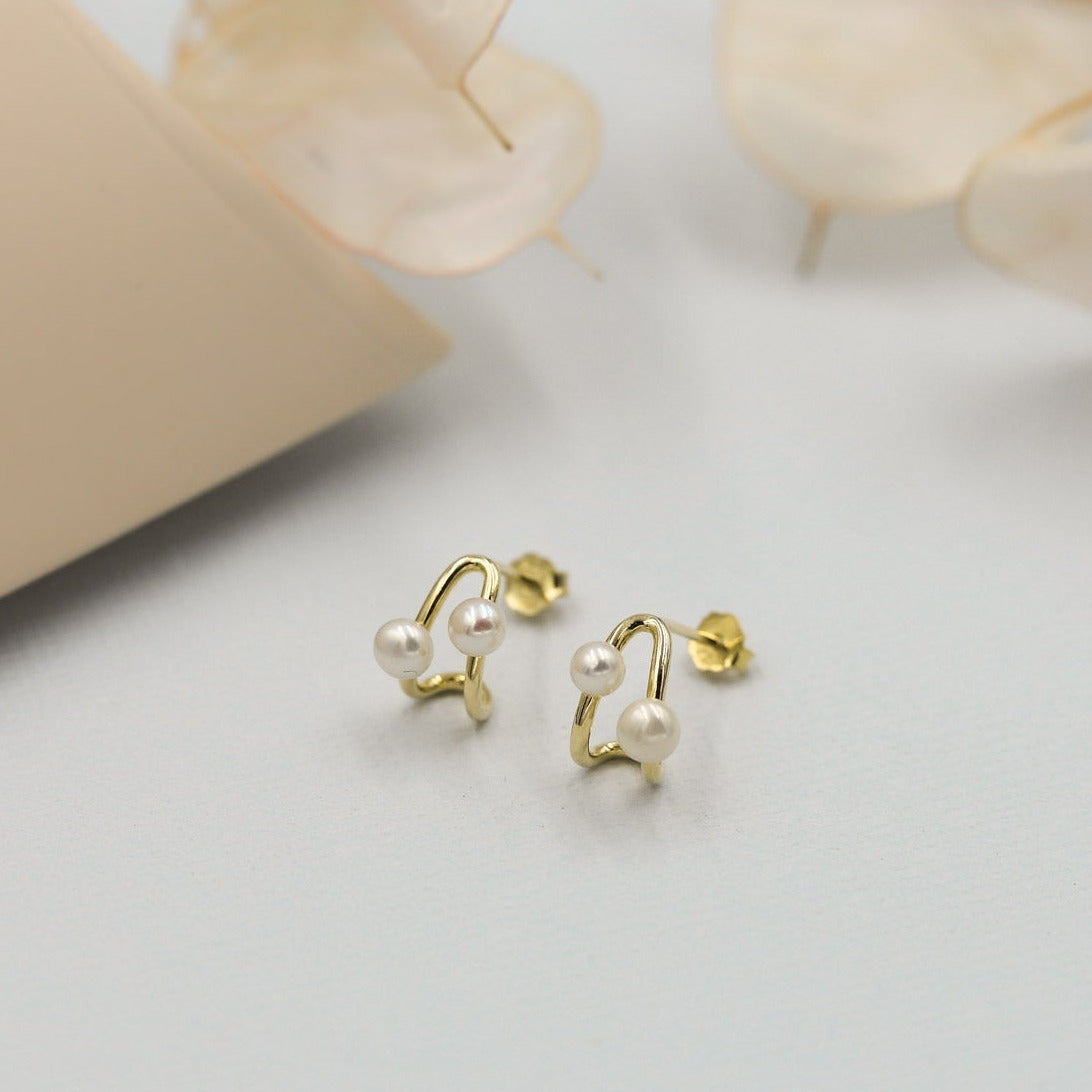 Aretes silueta dos perlitas