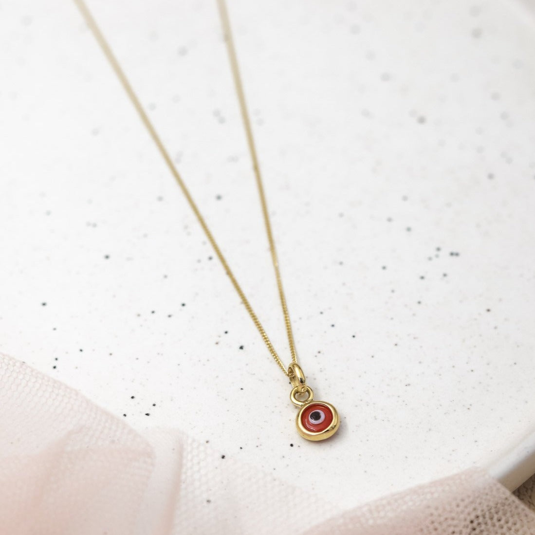 Dije ojo turco rojo oro 18k (precio no incluye cadena)