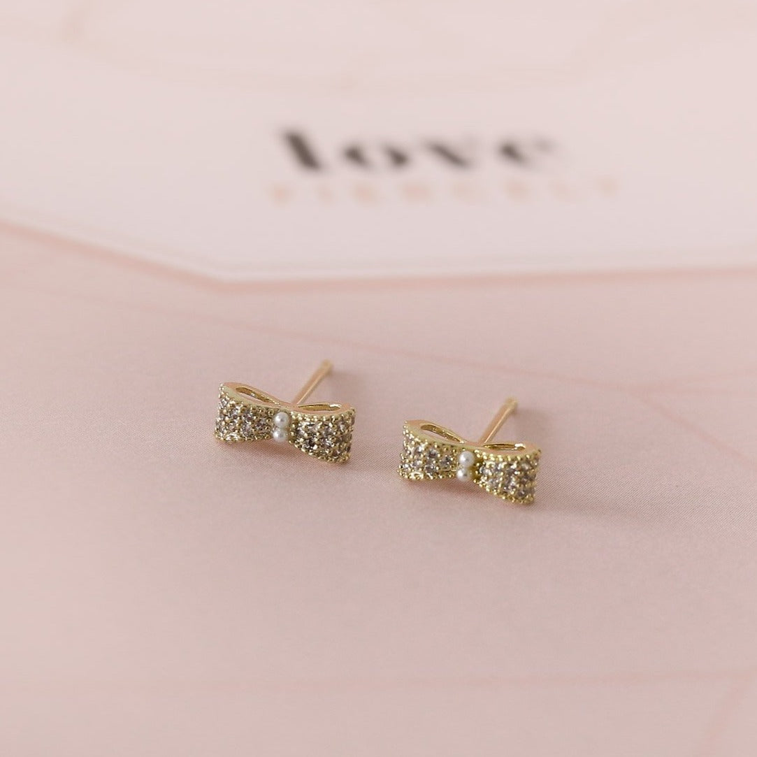 Aretes Lazos Strass Dos Perlitas