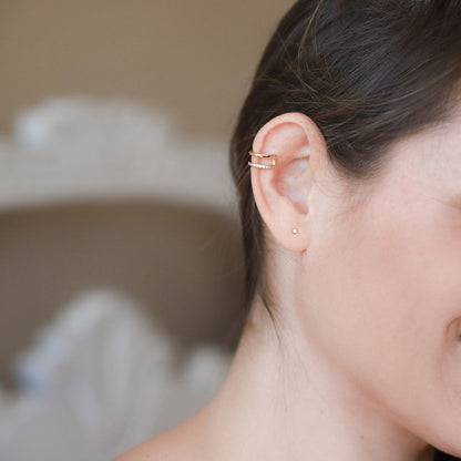 Aretes punto luz (plata bañada en oro)