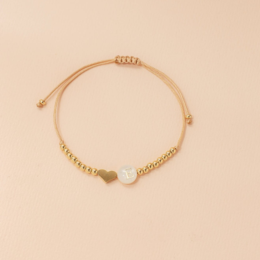 Pulsera sole esferas corazón e inicial