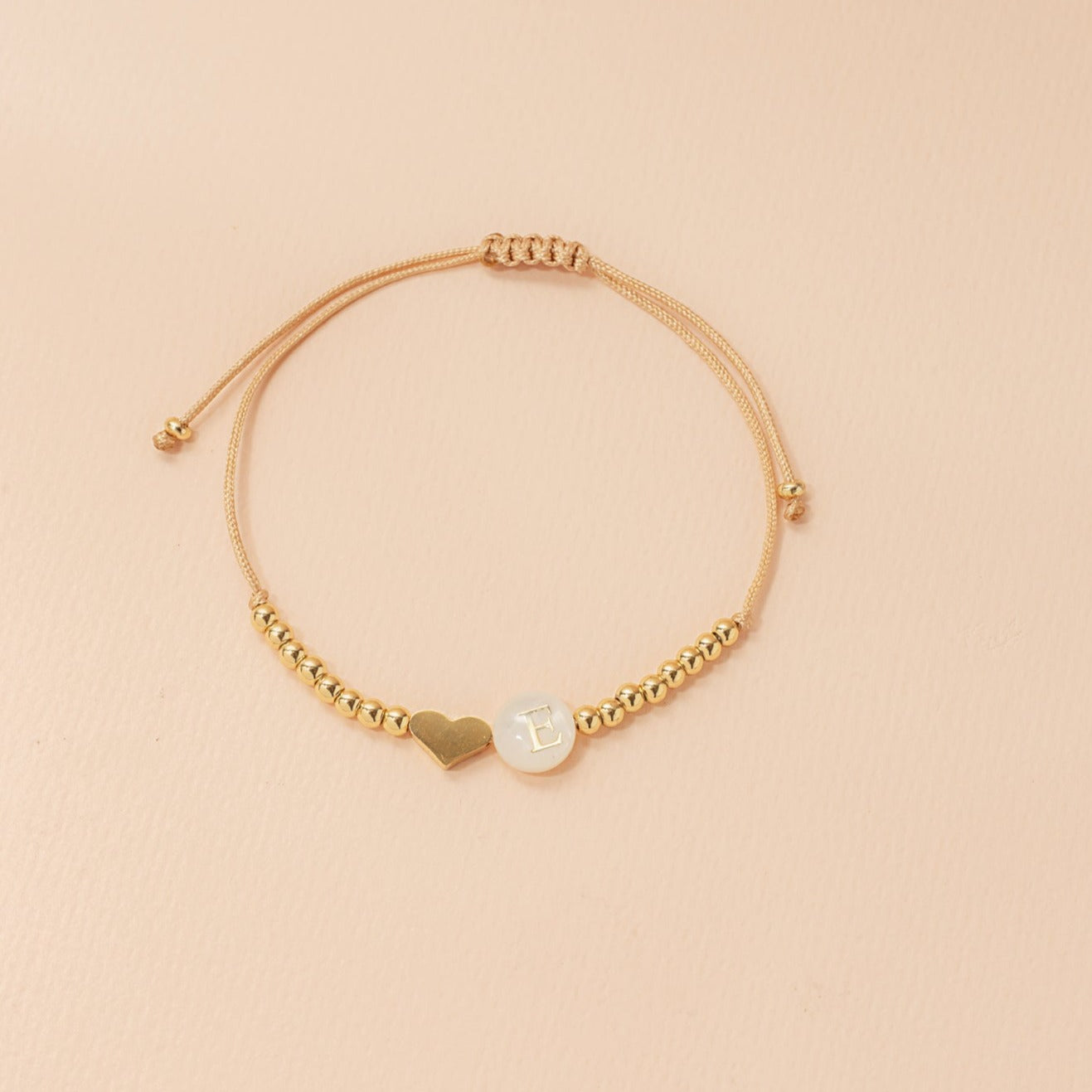 Pulsera sole esferas corazón e inicial
